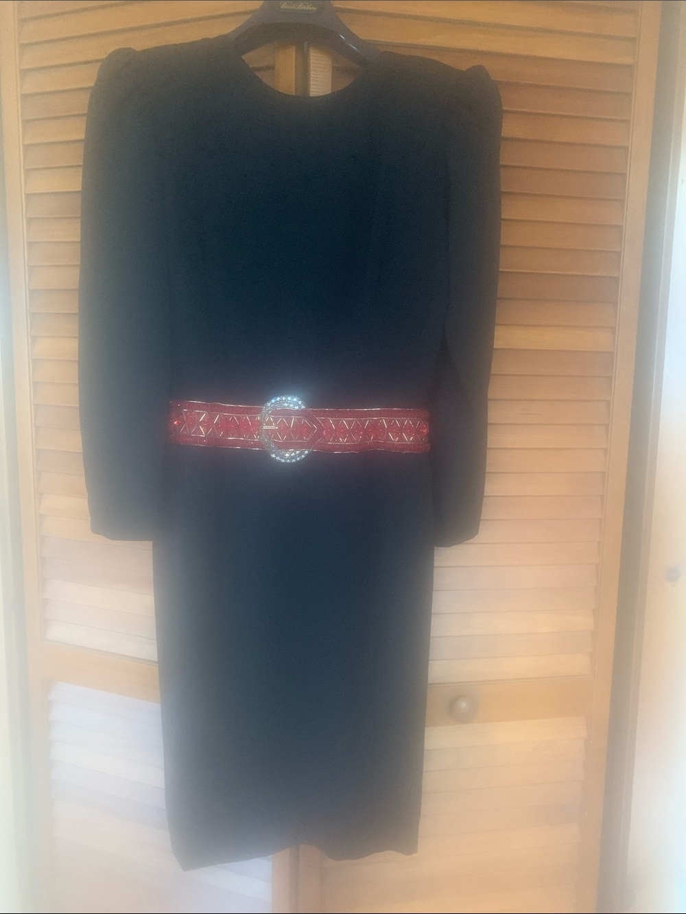 Caroline Herrera black dress with wide beaded attached belt area